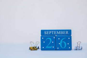 A calm scene with calendar blocks for 26 September