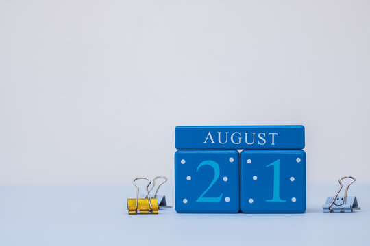 A calm scene with calendar blocks for 21 August