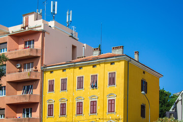 yellow colored building in the old town of Pula, Istrian Peninsula in Croatia