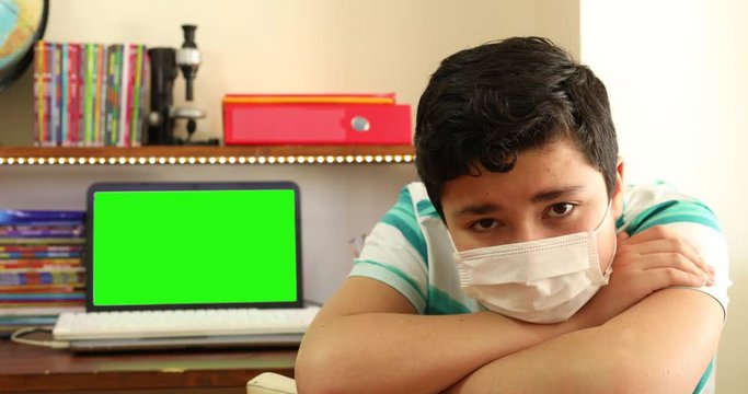 Home Isolation Concept  Epidemic Infection Covid-19 Distance Education At Home With Green Screen Laptop Monitor
