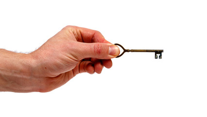 Male hand holding a vintage key isolated on white background. Minimalistic concept.