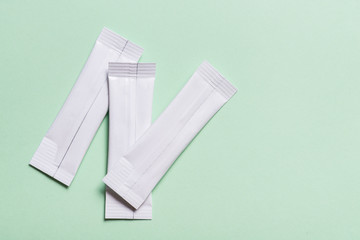 Set of white disposable packaging for snacks, food, sugar and spices. Sachets for medicines
