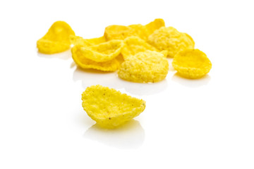 Cereals breakfast. Healthy Superfood corn flakes isolated on white background. Healthy eating, dieting and detoxication concept, space for text. Macro close-up shot.