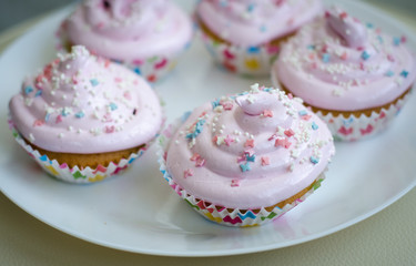 cupcakes with pink icing