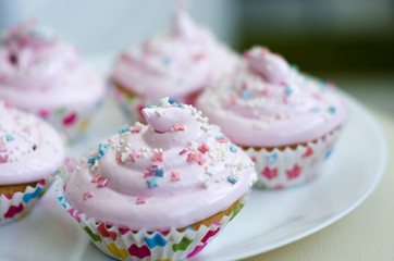 cupcakes with pink icing