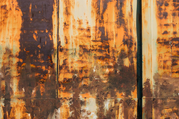 Rust on the old wall background.