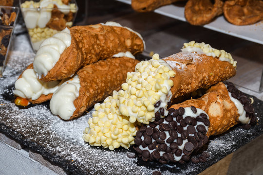 Cannoli consist of tube-shaped shells of fried pastry dough