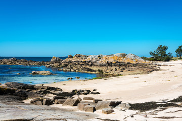 Fototapeta na wymiar Empty beach in the Illa de Arousa island in the Rias Baixas in Galicia, Spain.