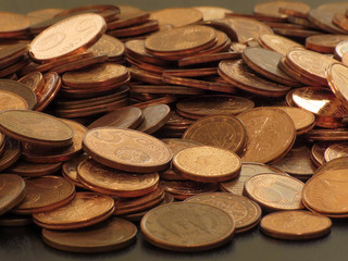 Coins on a table. Euros on a table, coins close-up. Savings in coins. Grow your savings. Stack of Coins. Growing Money.