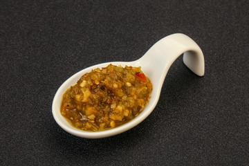 Green spicy sauce in the bowl