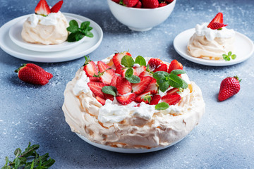 Cake Pavlova with meringue, strawberry and cream
