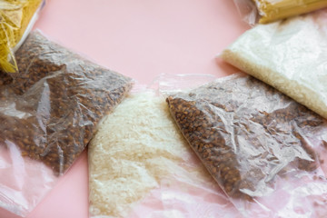 Food delivery home during quarantine: noodles, canned food, buckwheat, crackers.