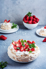 Cake Pavlova with meringue, strawberry and cream