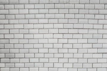 Texture of an old brick gray wall