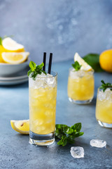 Fresh summer cocktail with lemons