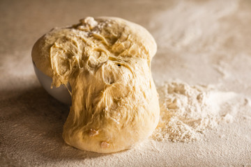 Fresh bread dough on white  kitchen table