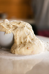 Fresh bread dough on white  kitchen table