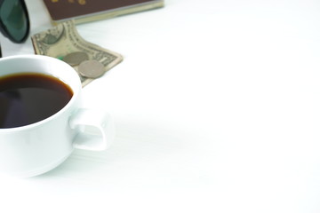 Black and silver coffee on a white desk