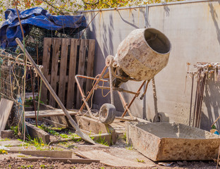 Portable cement mixer in private backyard