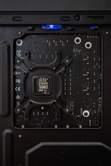 computer chips in a black case with blue backlight inside