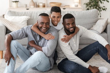 Obraz na płótnie Canvas Portrait of happy black multi generation family at home