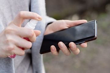 disinfection of the phone with an antiseptic