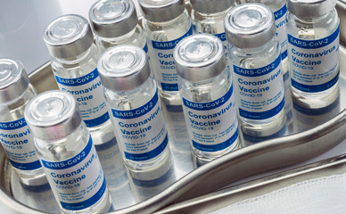 Coronavirus covid-19 experimental vaccine in a laboratory, conceptual image
