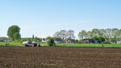 Fototapeta premium Tractor stand in Dutch landscape