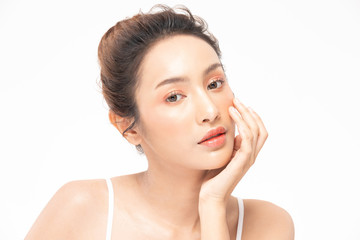 Fototapeta premium Beautiful Asian woman touching soft cheek smile with clean and fresh skin Happiness and cheerful with positive emotional,isolated on white background,Beauty and Cosmetics Concept