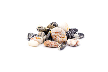 A pile of colorful pebbles on a white background with a shadow.