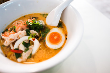 Tom Yum Seafood Noodle on a White Cup, Thailand.