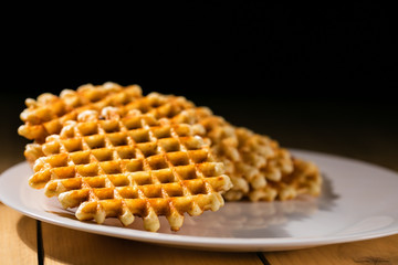 round belgian waffles on plate