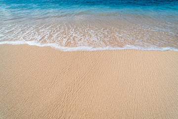 Blue sea wave, white foam, golden sand beach, turquoise ocean water close up, summer holidays border frame concept, tropical island vacation backdrop, tourist travel banner design template, copy space