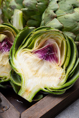 Obraz premium Big ripe uncooked green globe artichoks vegetables