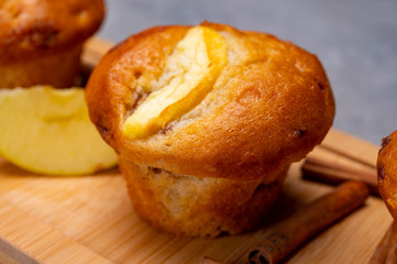 Fresh baked muffins with apple and cinnamon close up
