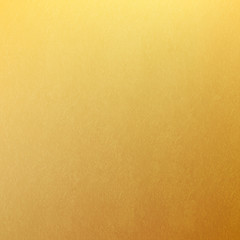 Shiny gold texture paper or metal. Golden vector background.