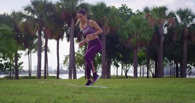 Athletic Girl doing agility training in park