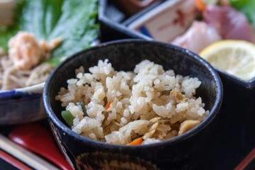 Fried rice with vegetables on a bowl, in a japanese diner