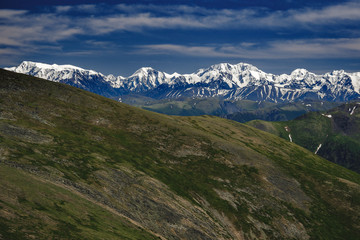 Spectacular view from the top of the mountain to the mountain range in the Ulagansky District of the Altai republic, Russia