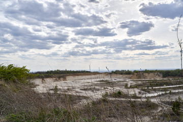 sandy quarry panorama with clouds top view