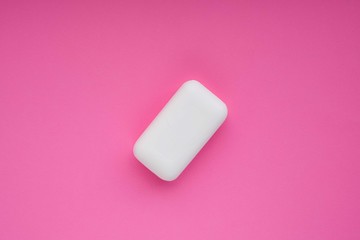 White soap on pink and green