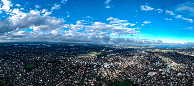 Panoramic Aerial Drone view above Belmore Sydney NSW Australia and western sydney suburbia 