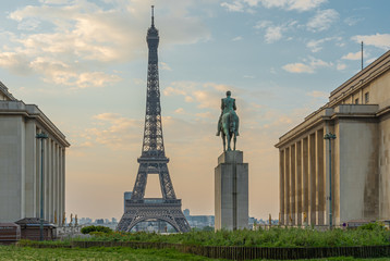 Fototapeta na wymiar Paris, France - 04 25 2020: View of the Eiffel Tower from the place of the trocadero and the equestrian statue of Marshal Foch during the coronavirus period