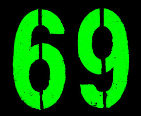 Number 69 green stencil digits painted on black weathered rust metal surface