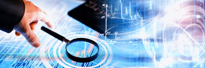 Business concept. Information technology and data processing. Hands over the screen with graphic data. A modern software product in business.