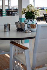 Flowers in the beach cafe decoration