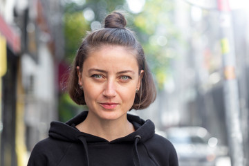 Portrait of a happy young woman in daylight