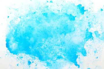 Hand painted blue watercolor abstract stain on white paper. Paint splash background