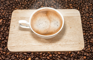 Coffee cup and beans on a white background. coffee cup and coffee beans.