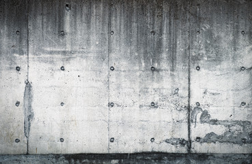 古びたコンクリート打ち放しの壁の背景テクスチャー